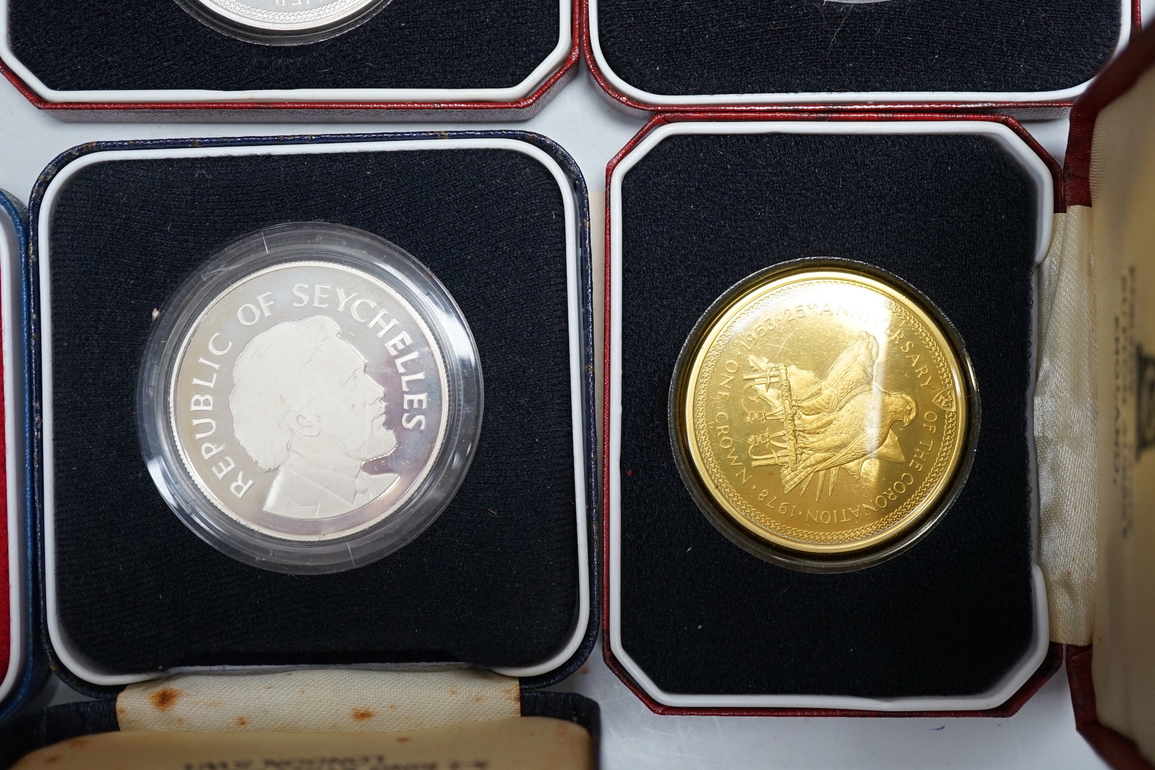 Eight Royal Mint proof silver crowns and six Pobjoy Mint silver crowns